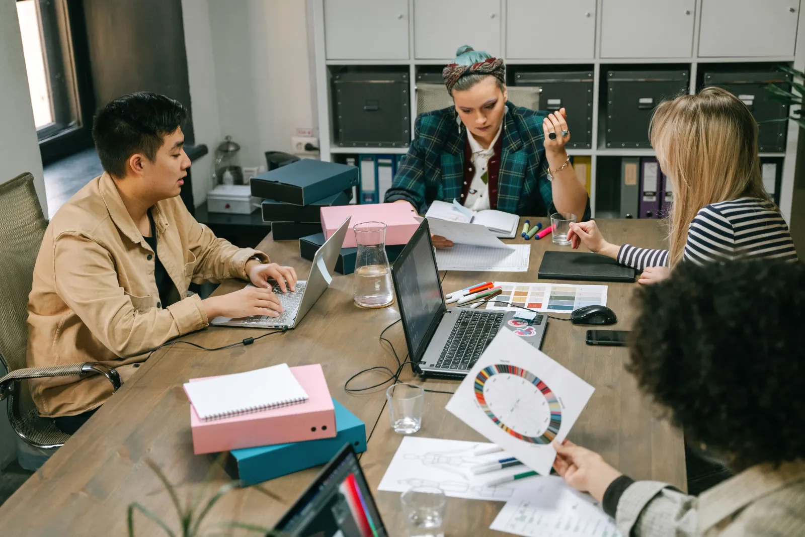 Media team organising content in Aetopia